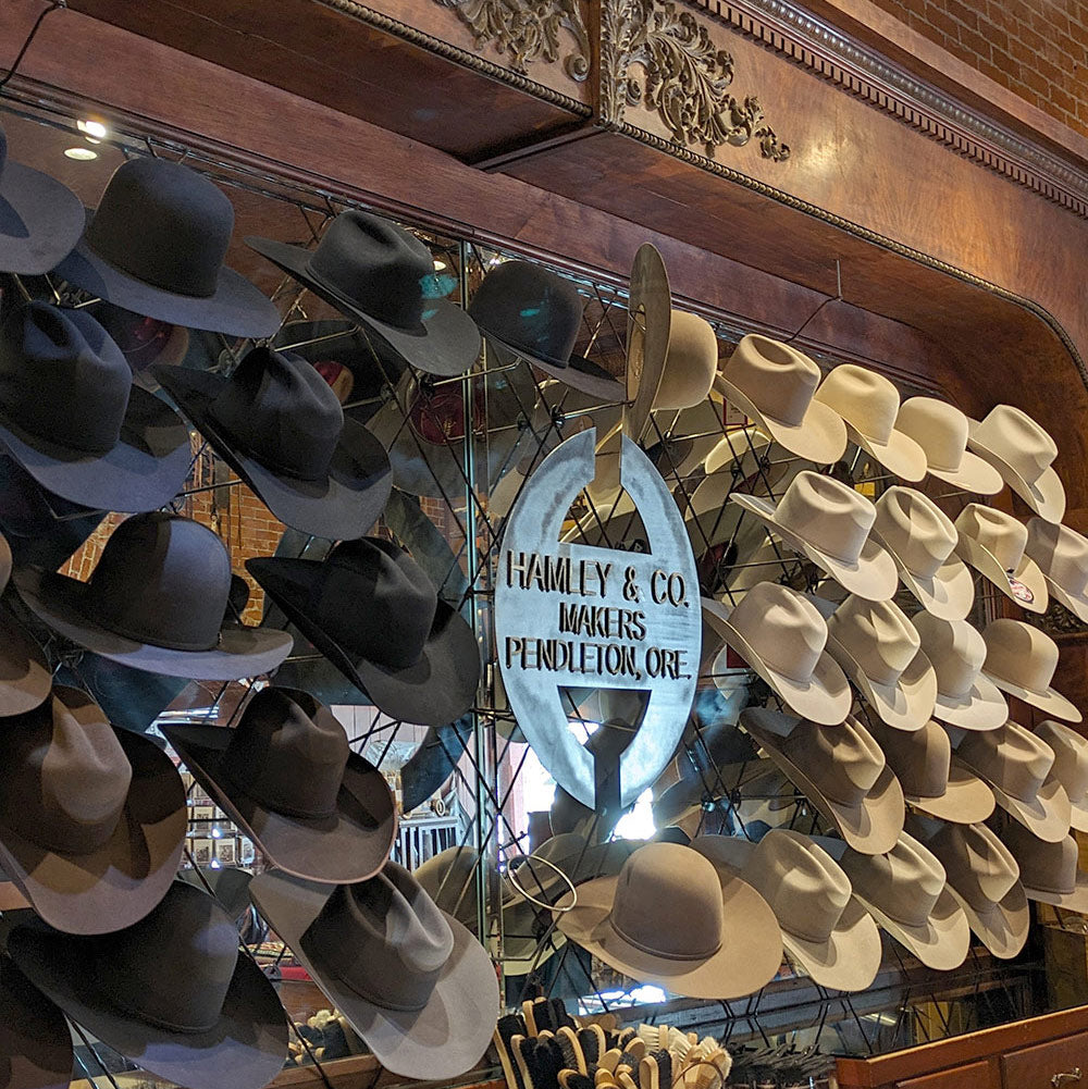 Large selection of hats at Hamley and Company Makers